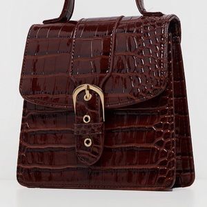 Brown reptile bag